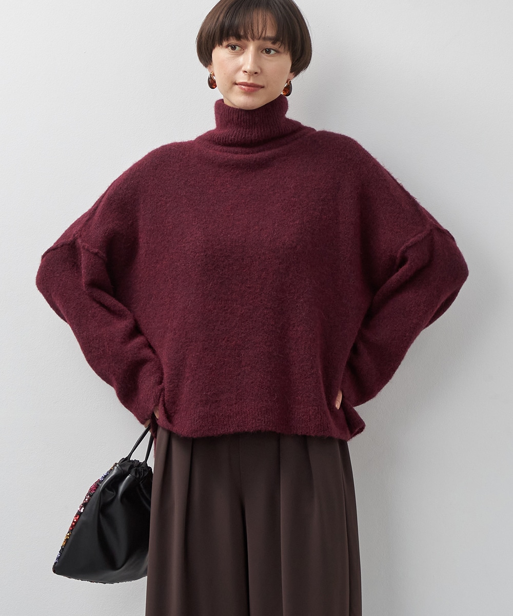  armoire capriceのハイネックルーズニット